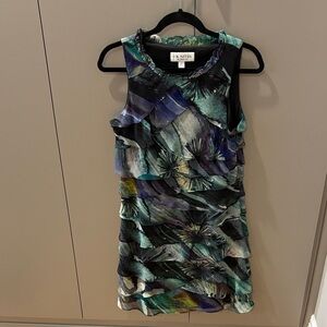 J R Nites by Carol Lin